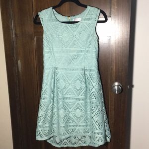 A light blue / turquoise dress